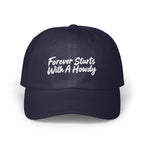 A navy blue baseball cap with white embroidered text reading Forever Starts With A Howdy.
