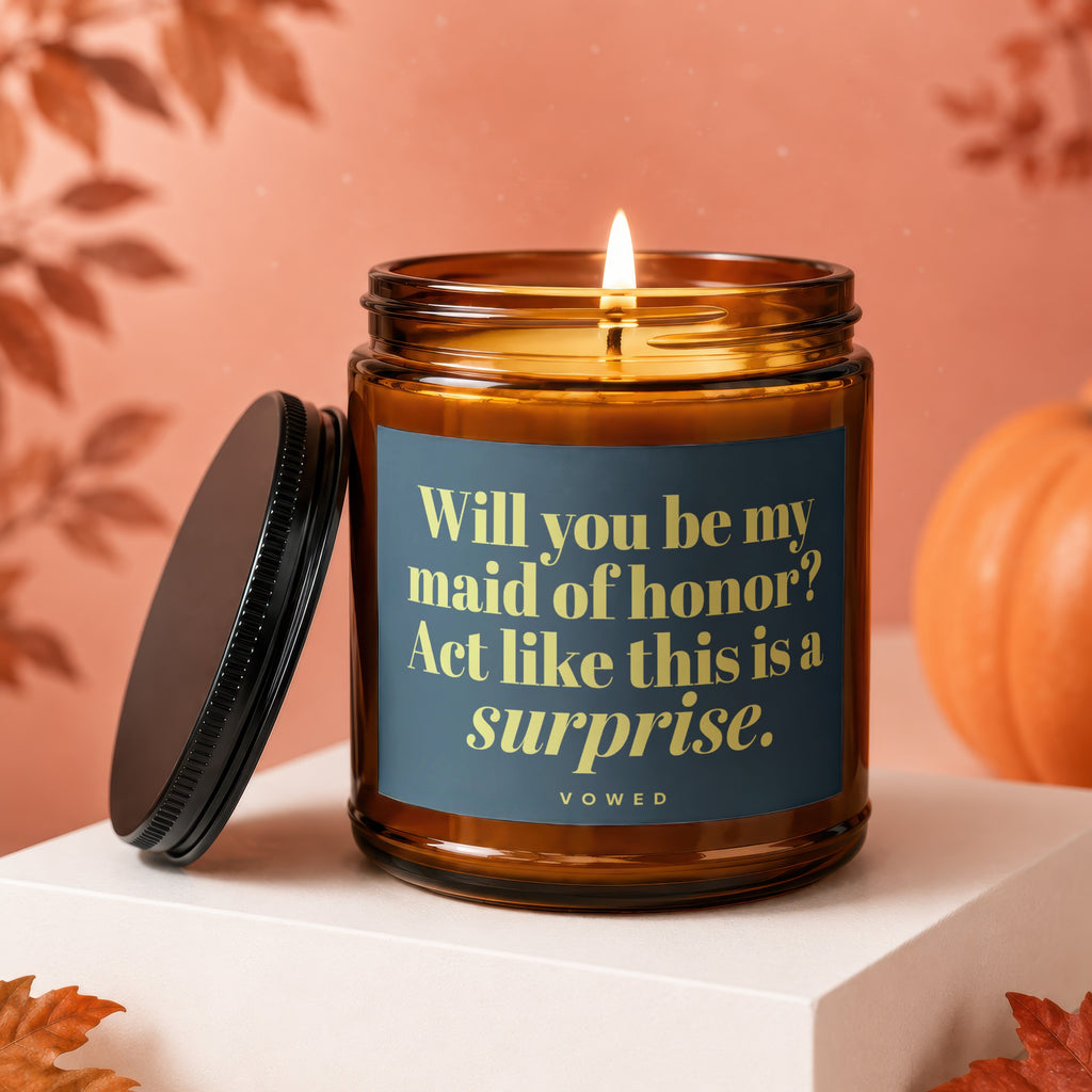 Amber jar candle with text: "Will you be my maid of honor? Act like this is a surprise."