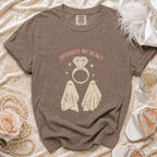 Brown t-shirt with "Spooked My Heart" text, diamond ring, and ghosts graphic.