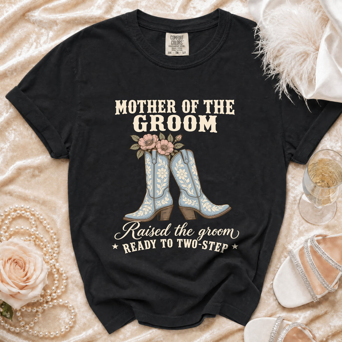 Black t-shirt with "Mother of the Groom" text and cowboy boots graphic.