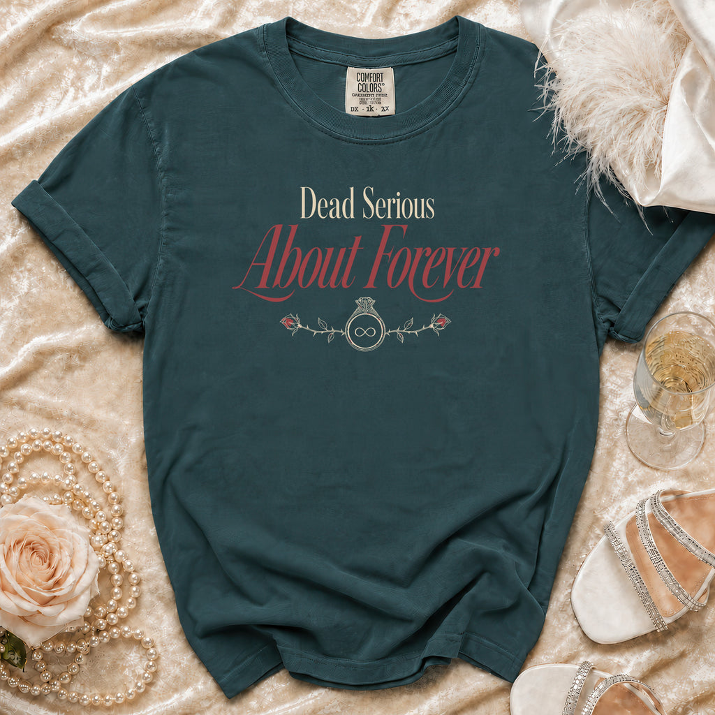 Teal t-shirt with "Dead Serious About Forever" graphic, ring, roses, and infinity symbol.