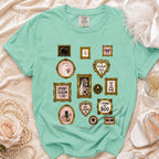 Mint green t-shirt with framed gothic and romantic wedding-themed graphics.