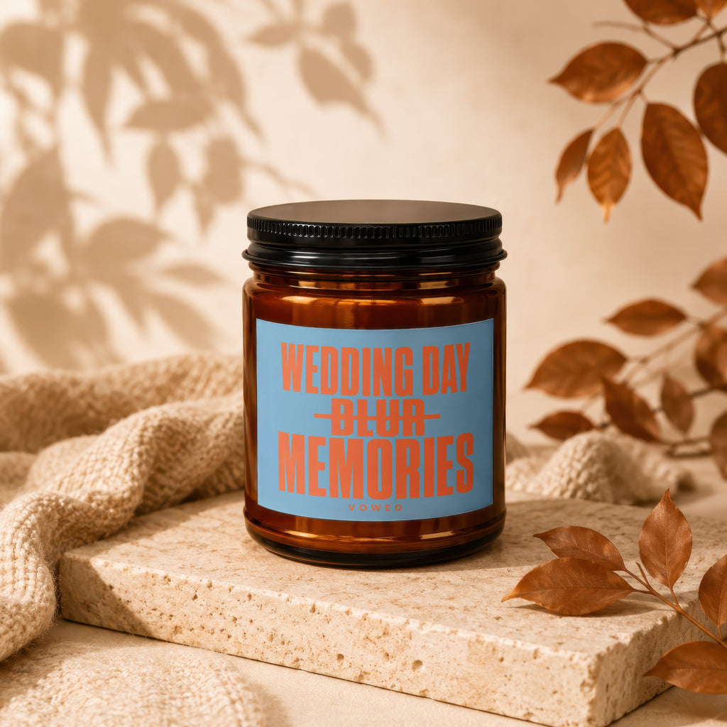 Amber candle with blue label reading "WEDDING DAY BLUR MEMORIES VOWED".