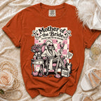Orange t-shirt with "Mother of the Bride (I'm Just Here for the Open Bar)" graphic.