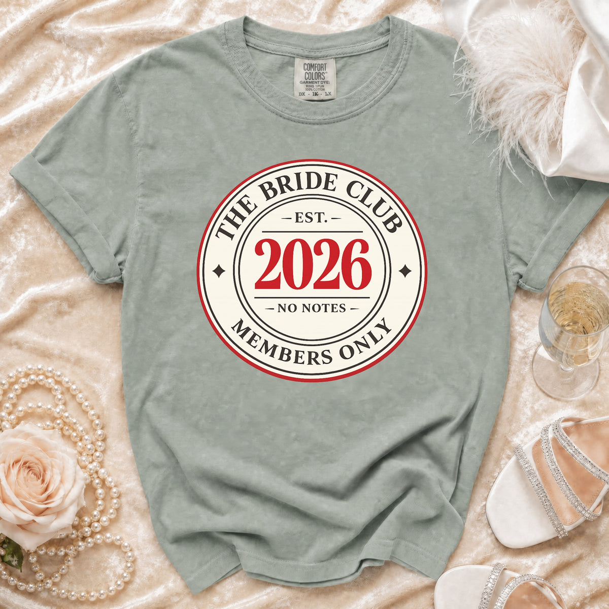 Comfort Colors tee styled flat with pearls, a rose and champagne