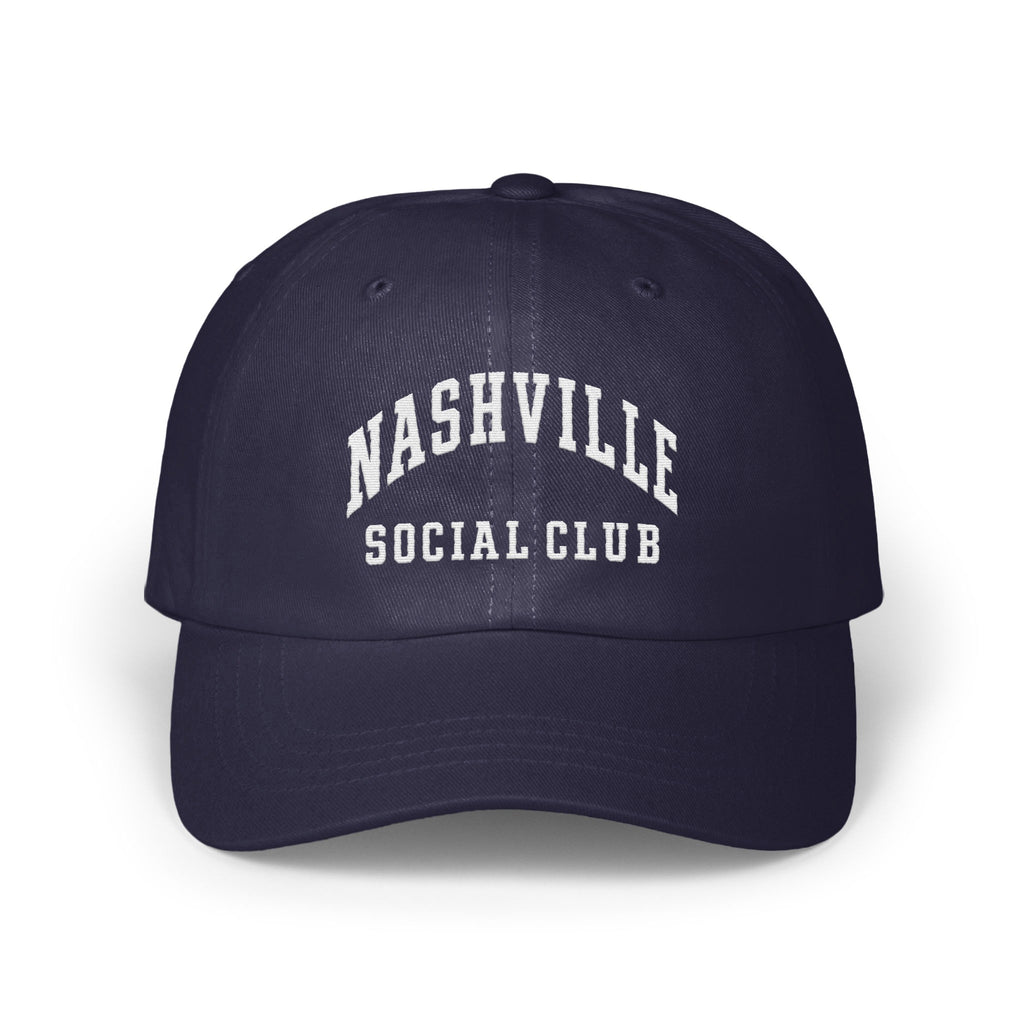 A dark navy blue baseball cap with white embroidered text reading Nashville Social Club on the front.