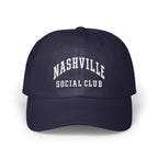 A dark navy blue baseball cap with white embroidered text reading Nashville Social Club on the front.
