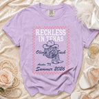 T-shirt with "Reckless in Texas" and "Olivia Bach Austin, TX Summer 2026" text.