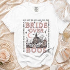 White t-shirt with "Bride Over Boos" Halloween design and biblical text.