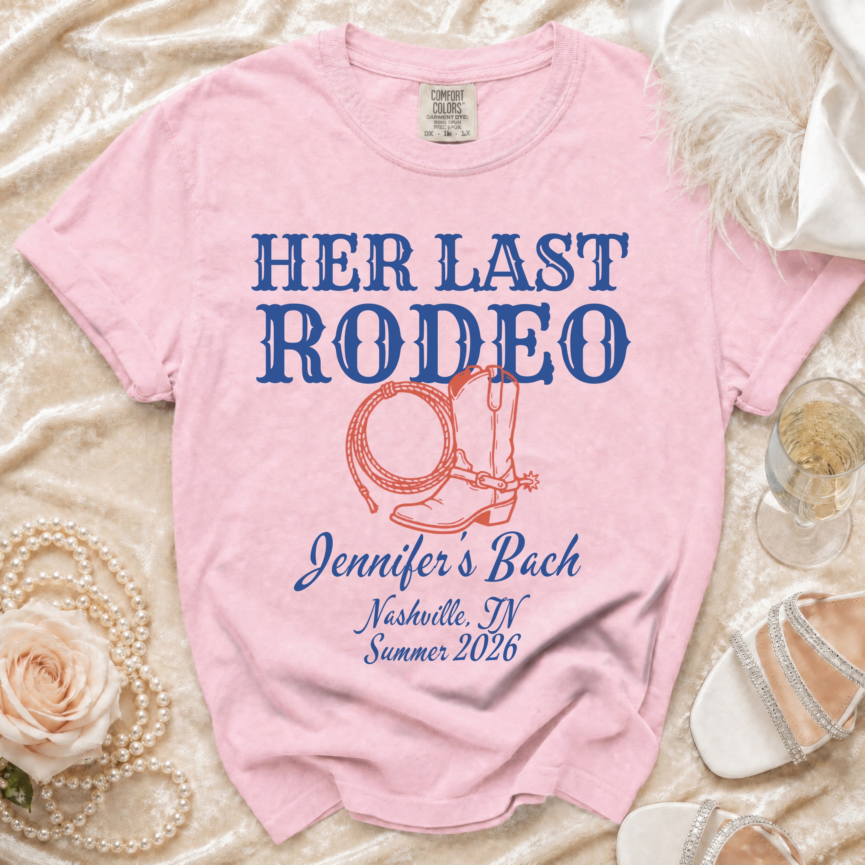 Pink t-shirt with "HER LAST RODEO Jennifer's Bach Nashville, TN Summer 2026" in blue text.