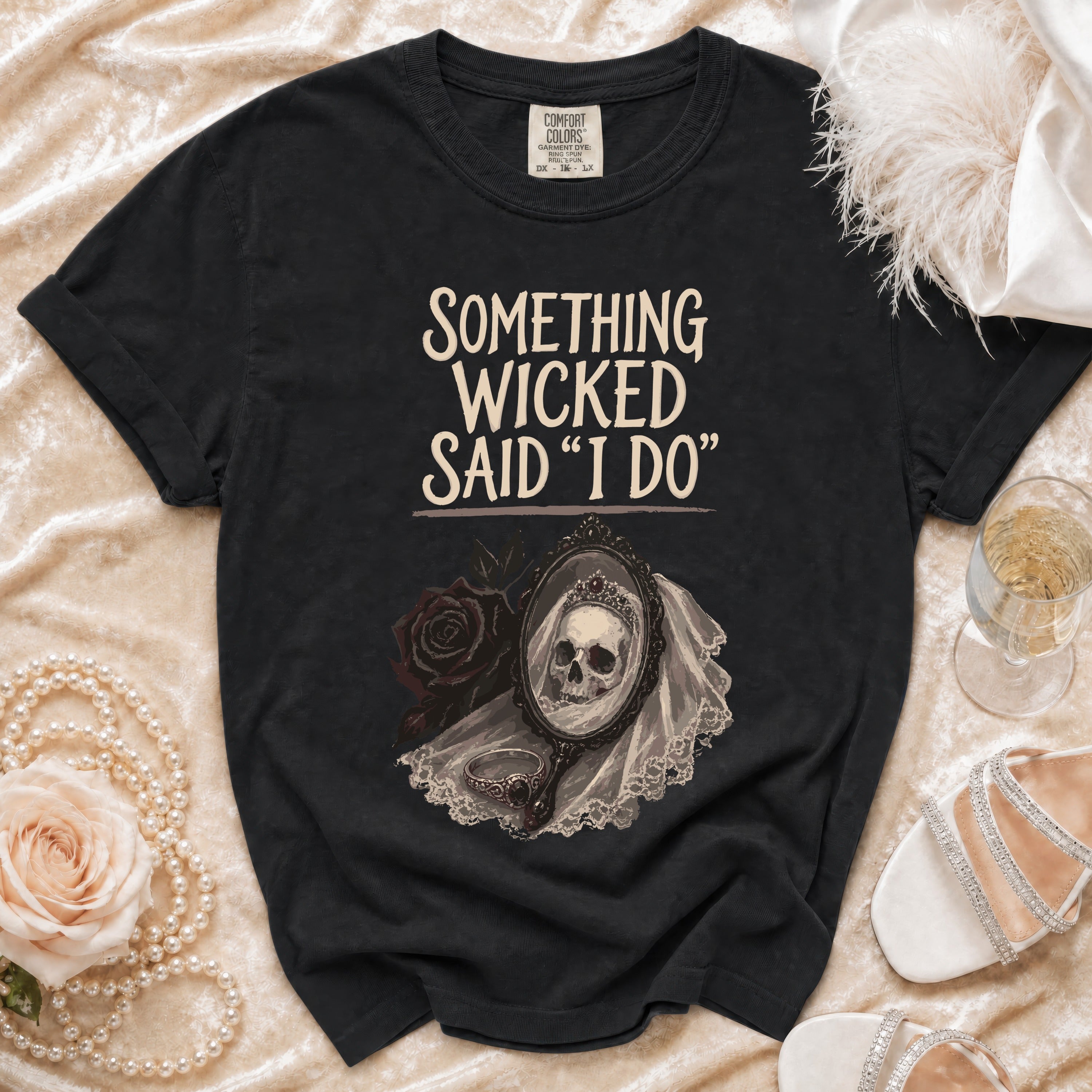 Black t-shirt with "Something Wicked Said 'I Do'" text and skull in bridal veil.