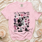 Pink t-shirt with skeleton bride and groom, Halloween motifs, and wedding text.