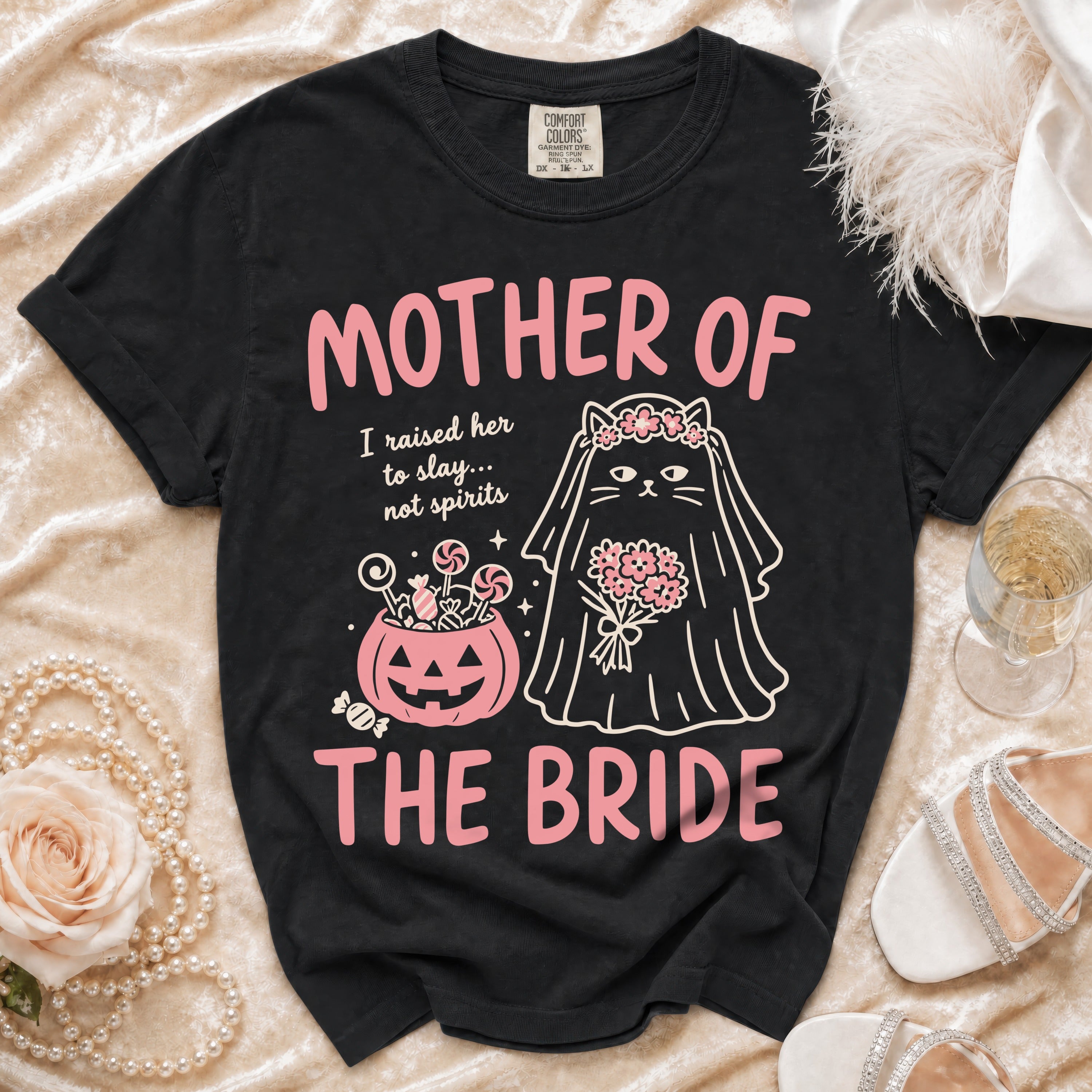 Black t-shirt with "Mother of the Bride" text and a cat bride illustration.