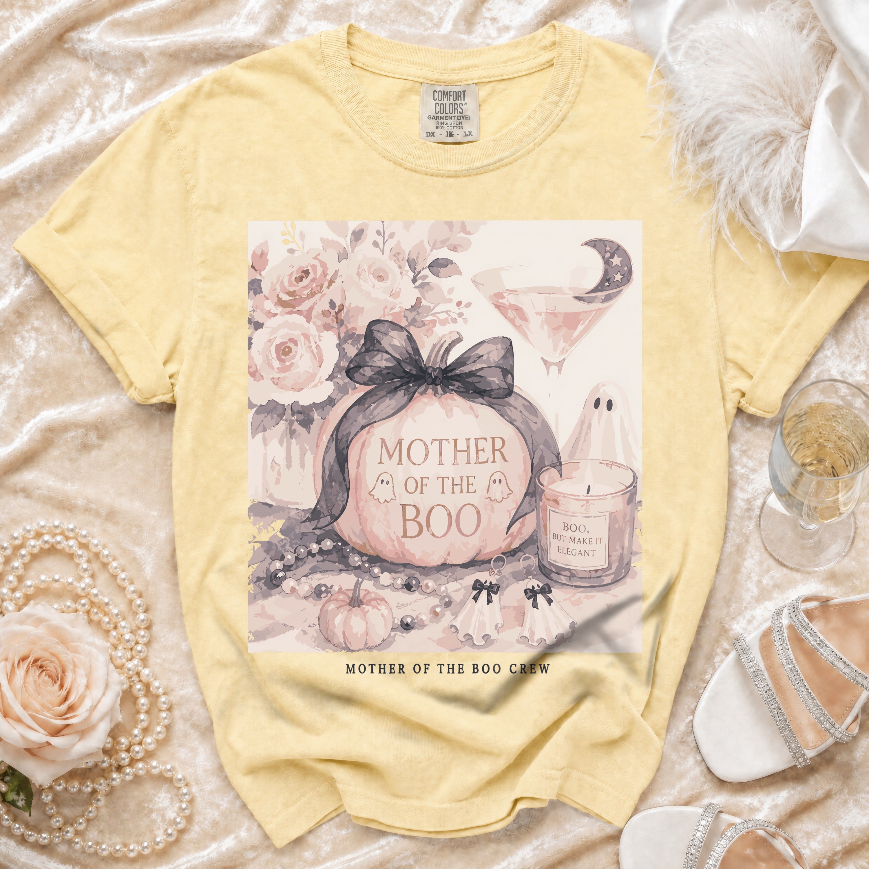 Yellow t-shirt with "Mother of the Boo Crew" Halloween graphic.