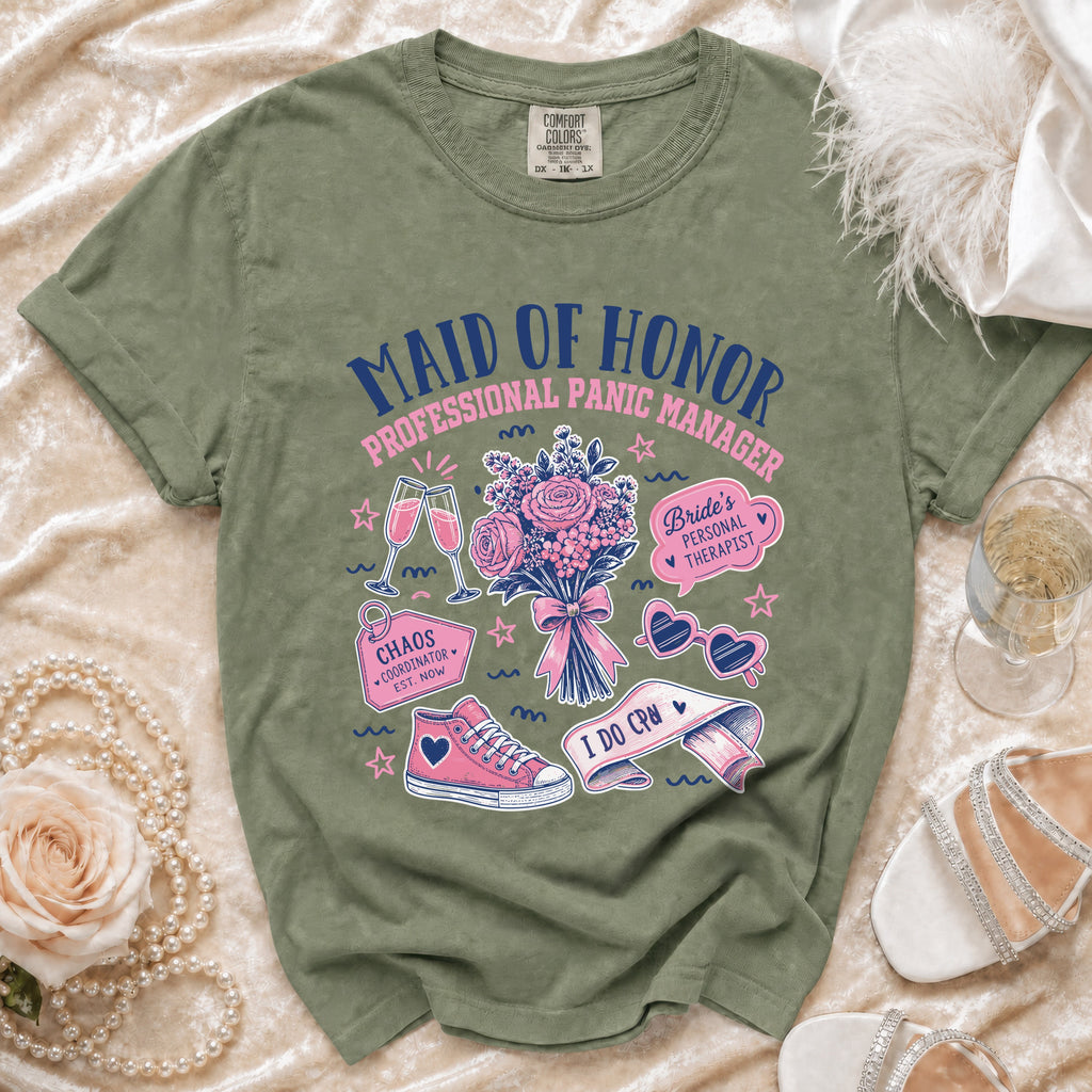 Olive green t-shirt promoting a "Maid of Honor Professional Panic Manager" with humorous graphics.