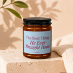 Candle with text "The Best Thing He Ever Brought Home" by VOWED.