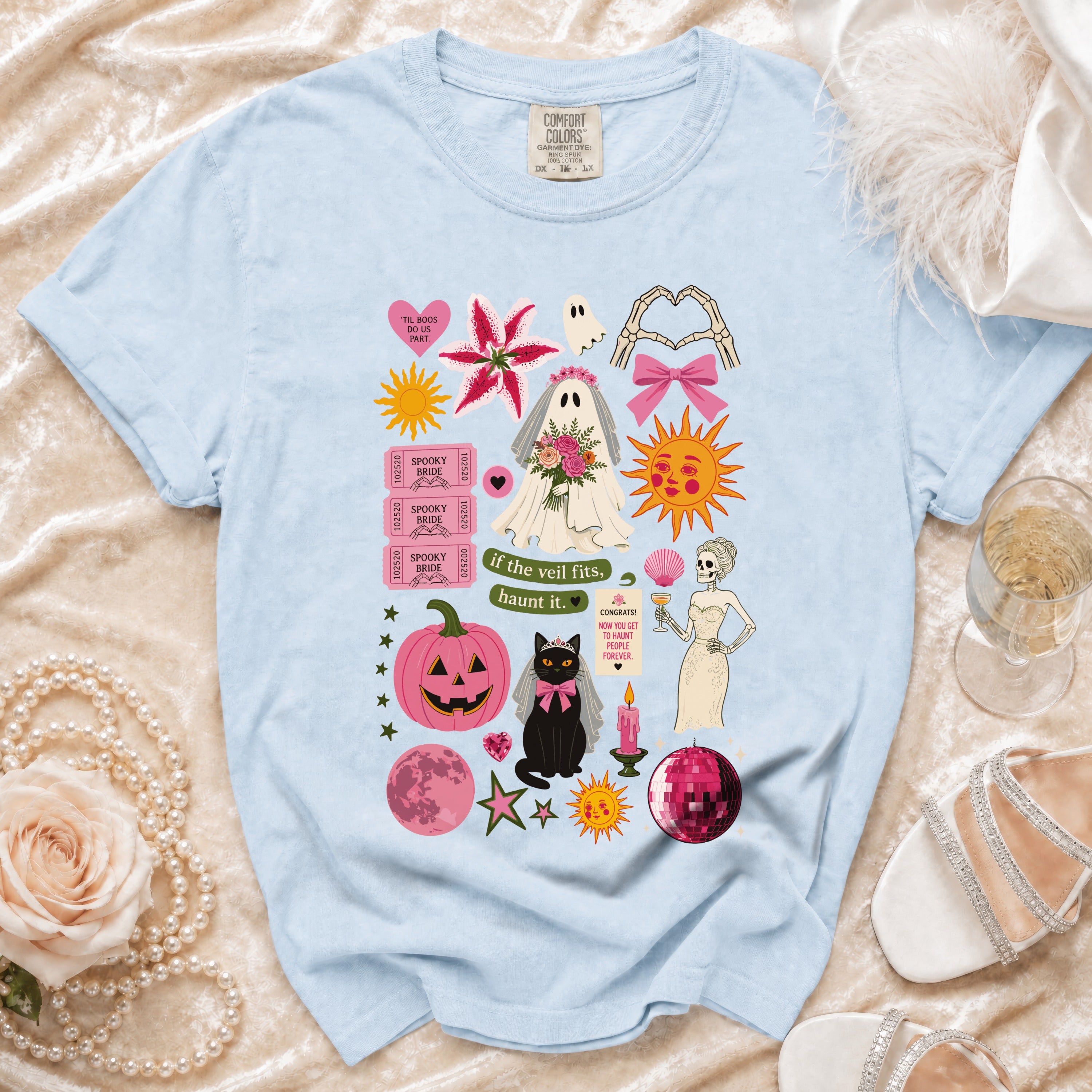 Light blue t-shirt with Halloween wedding graphics including a ghost bride and black cat.