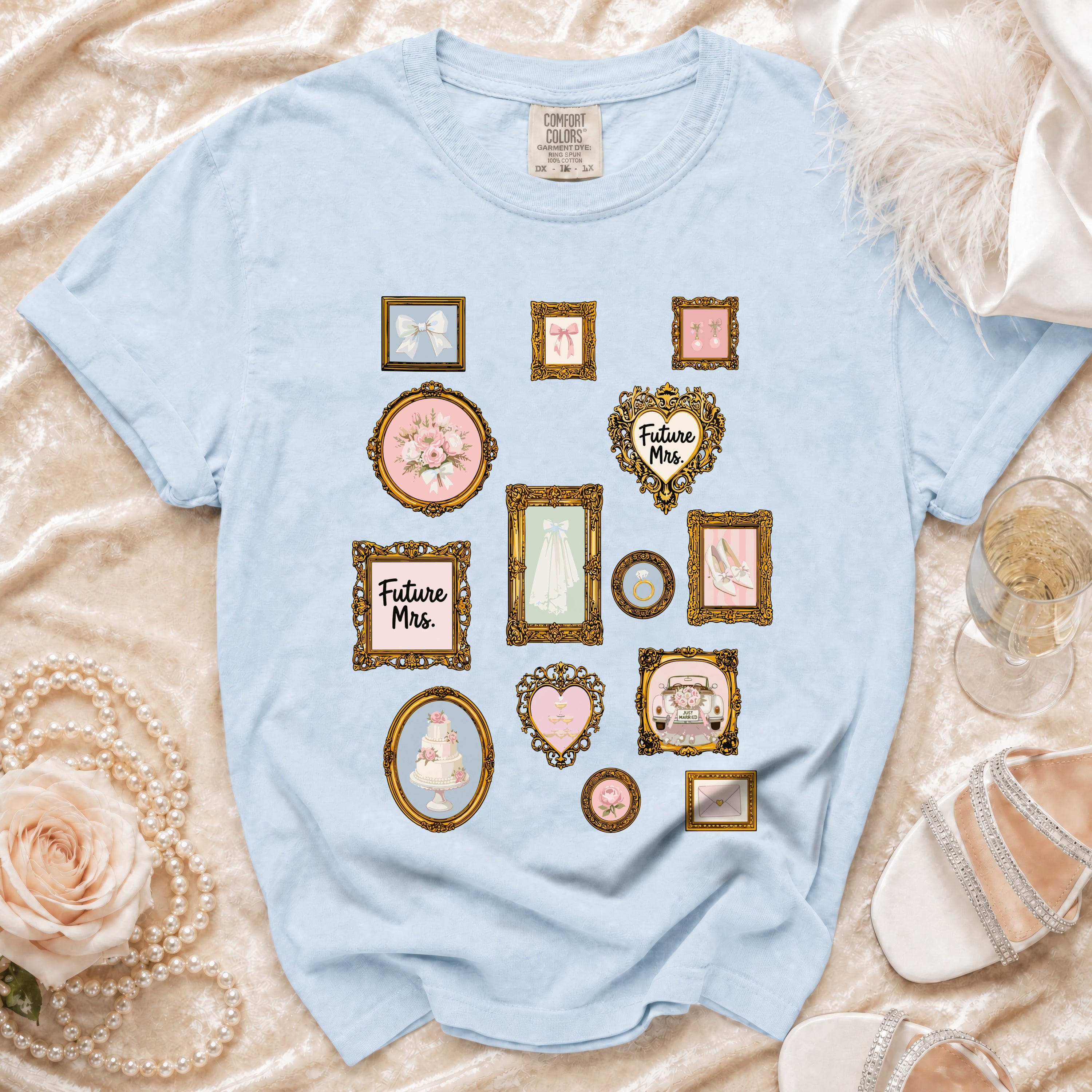 Light blue t-shirt with ornate frames featuring wedding motifs and "Future Mrs." text.