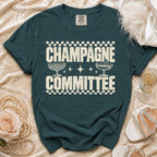 Teal t-shirt with "Champagne Committee" text and champagne glasses.