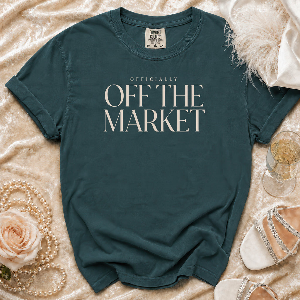 Dark teal Comfort Colors t-shirt with "Officially Off The Market" text.