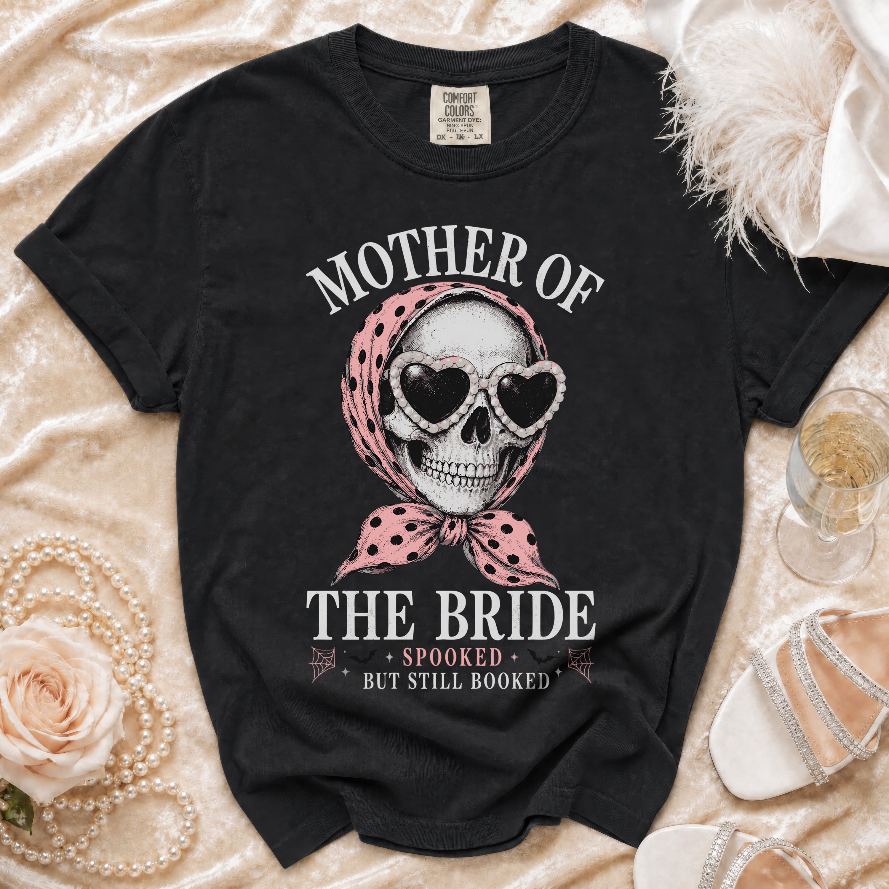 Black t-shirt with "Mother of the Bride, Spooked but Still Booked" graphic.