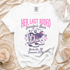 White t-shirt with "HER LAST RODEO" and Western-themed graphics.