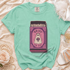 Mint t-shirt with a "Bride or Die" ghost graphic on a matchbox.