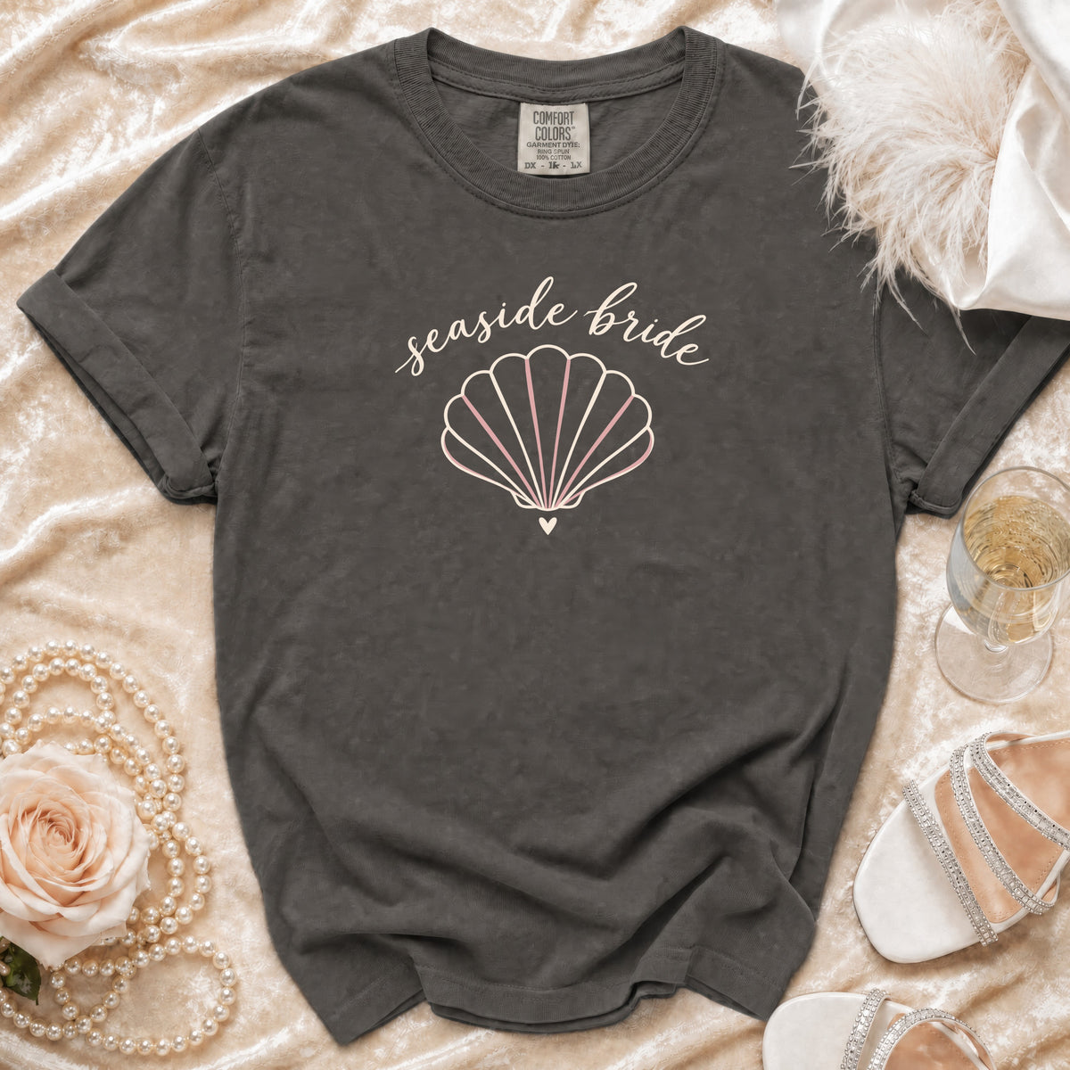 Grey t-shirt with "seaside bride" text and a scallop shell design.