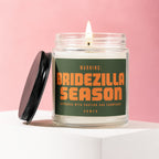 Jar candle with lit flame, featuring text "WARNING: BRIDEZILLA SEASON APPROACH WITH CAUTION AND CHAMPAGNE. VOWED".