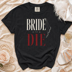 Black t-shirt with "BRIDE OR DIE" text and a lace veil graphic.