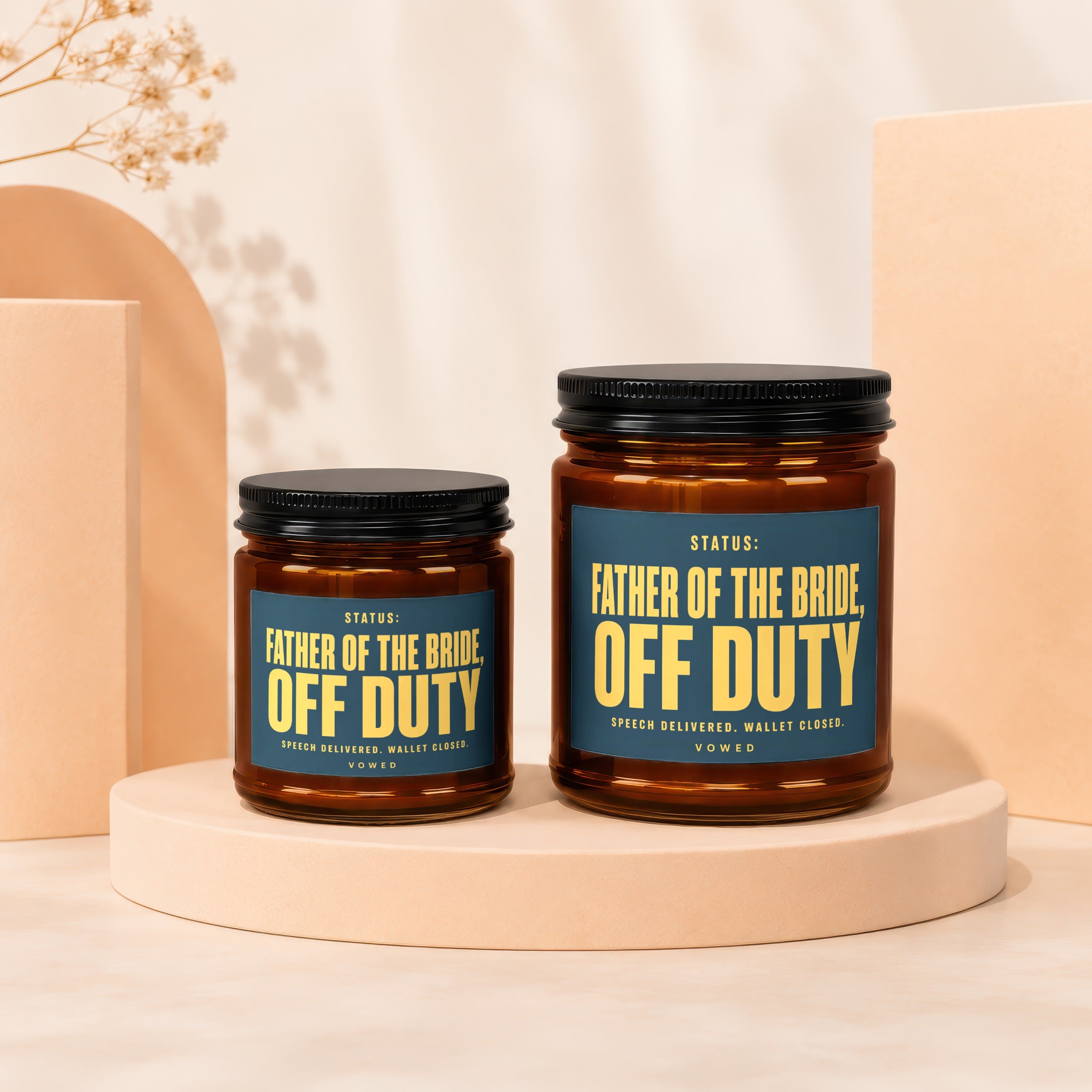 Two amber glass candles labeled "Father of the Bride, Off Duty".