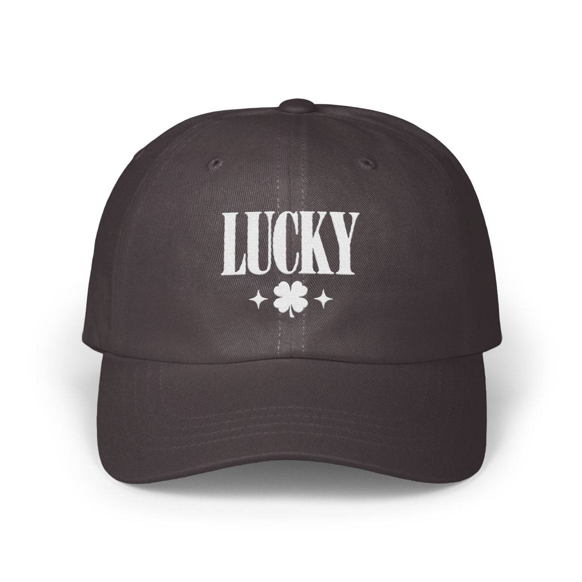 A dark grey baseball cap with white embroidered text reading LUCKY above a four-leaf clover.