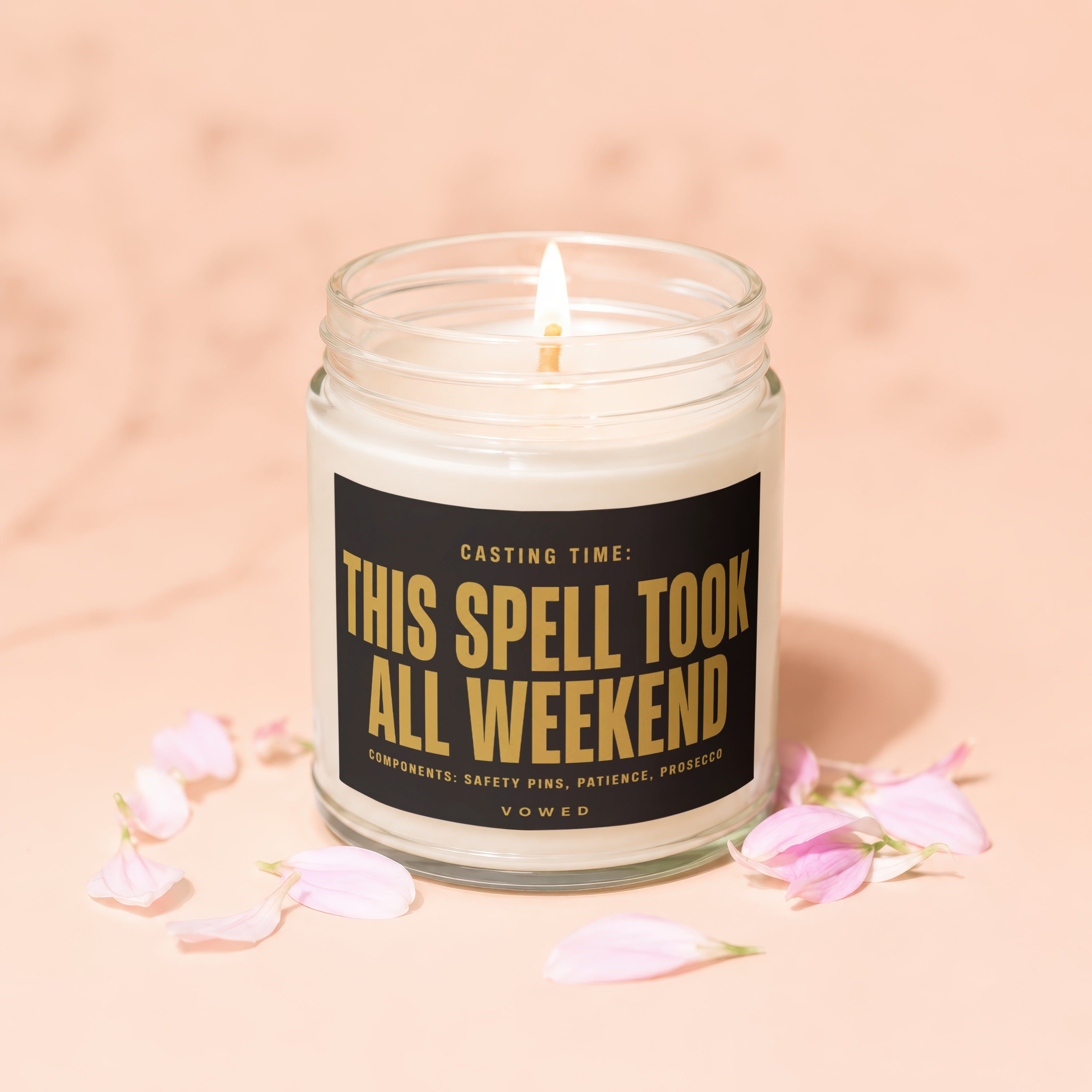 Candle with text "This spell took all weekend" and "vowed".