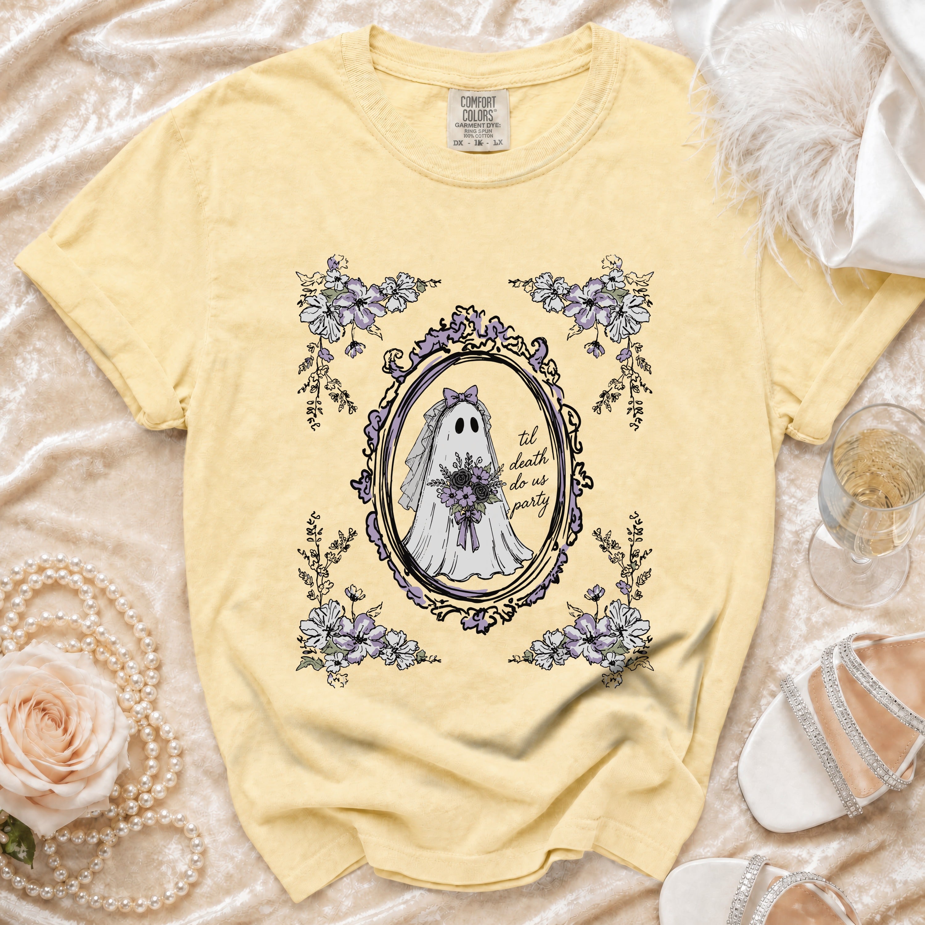 Yellow t-shirt with ghost bride graphic and floral border.