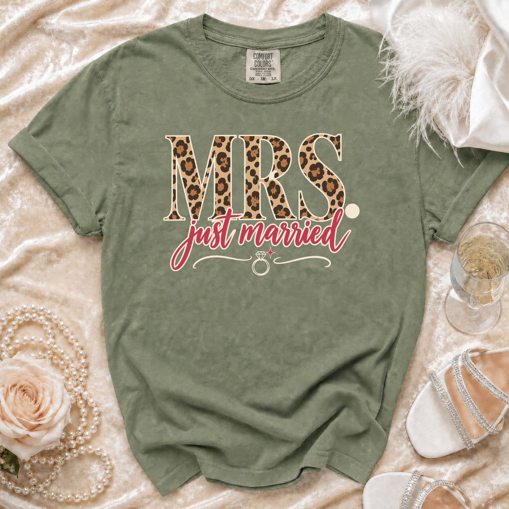 Green t-shirt with "MRS." in leopard print and "just married" text.