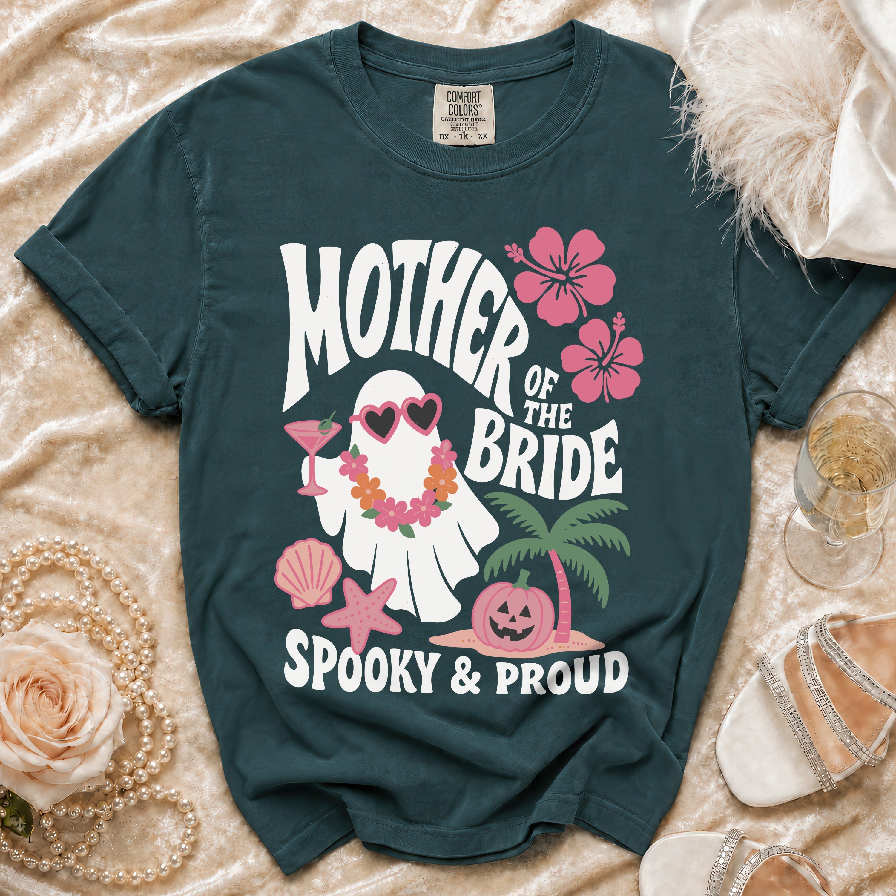 Dark teal t-shirt with "Mother of the Bride" text and a spooky ghost graphic.