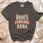 Dark grey t-shirt with "Bride's Fabulous Nana" text, pearls, rose, and champagne.