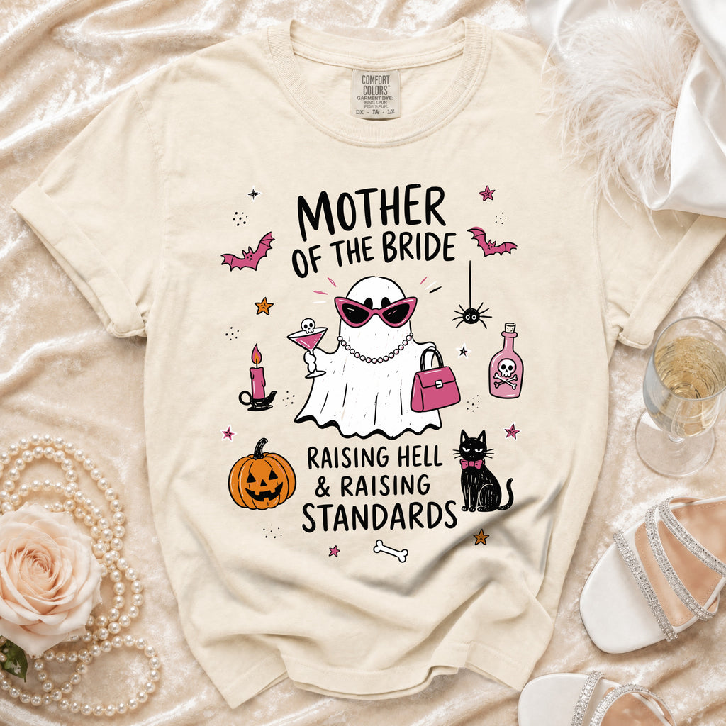 T-shirt with ghost graphic that says "Mother of the Bride Raising Hell & Raising Standards."