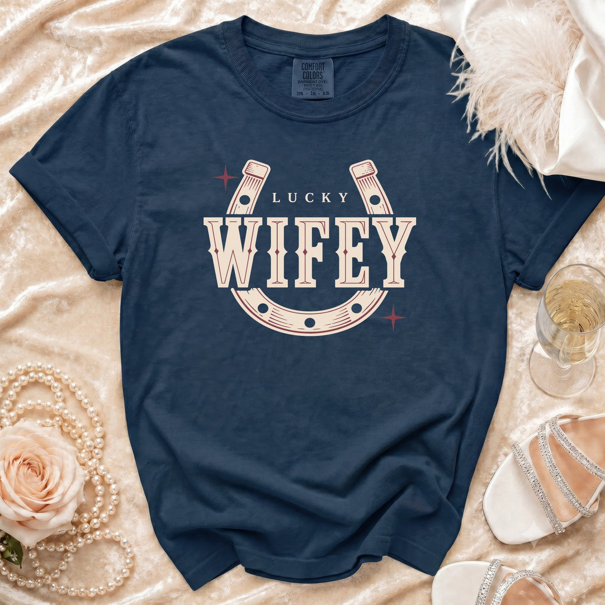 Navy t-shirt with "LUCKY WIFEY" text and horseshoe graphic.