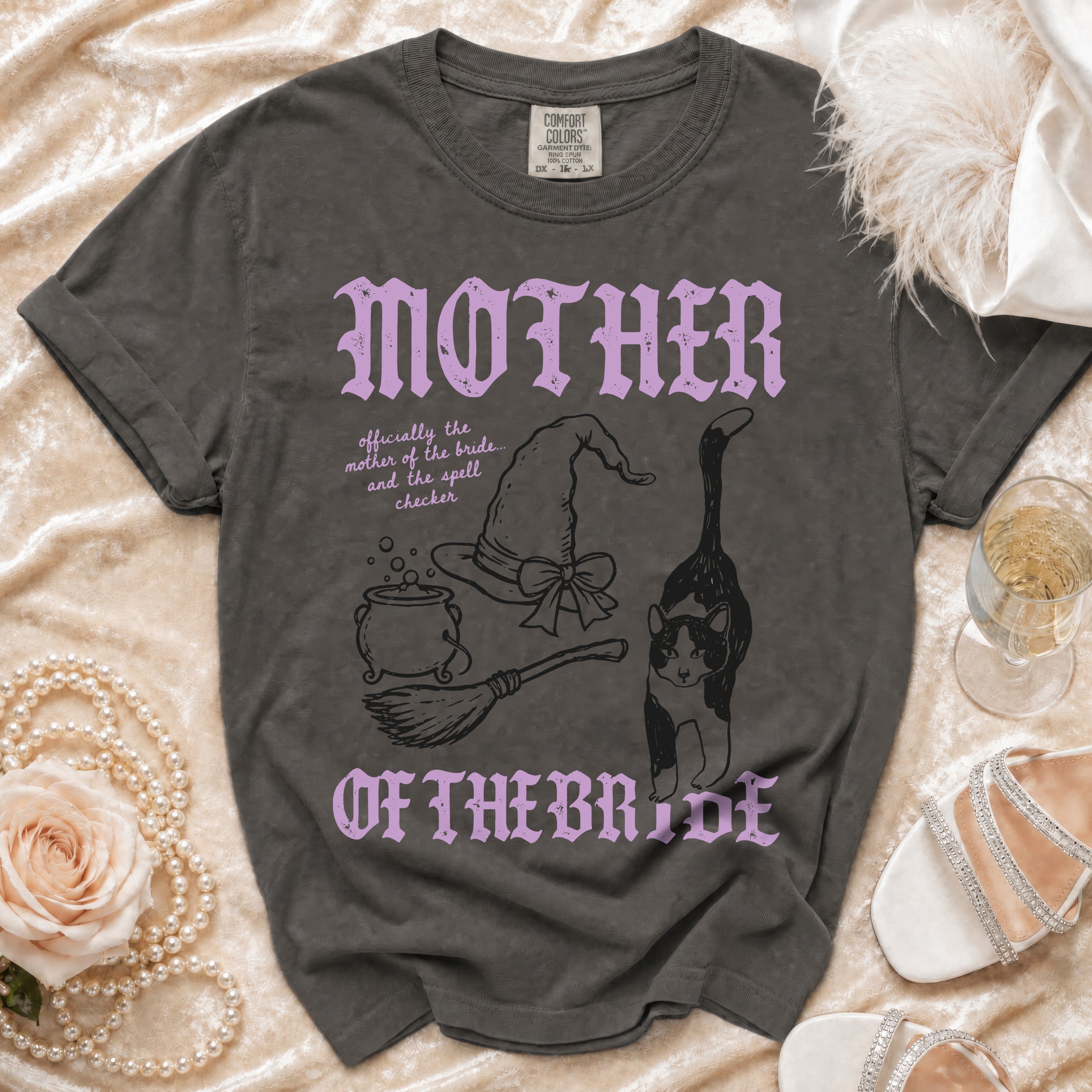 Dark grey t-shirt with "MOTHER OF THE BRIDE" and witchy graphics.