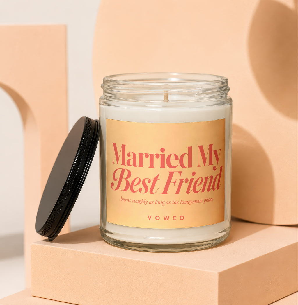 Glass jar candle with label that says "Married My Best Friend"