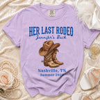 Lavender t-shirt with "Her Last Rodeo" and cowboy boots graphic.