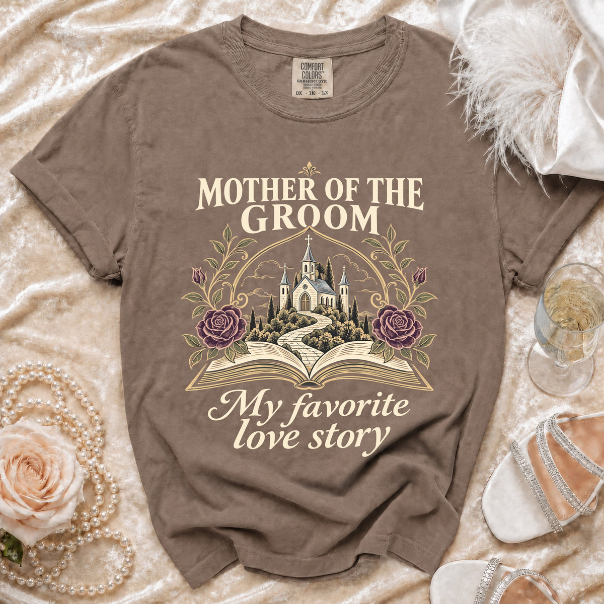 Brown t-shirt with "MOTHER OF THE GROOM, My favorite love story" text and wedding church graphic.