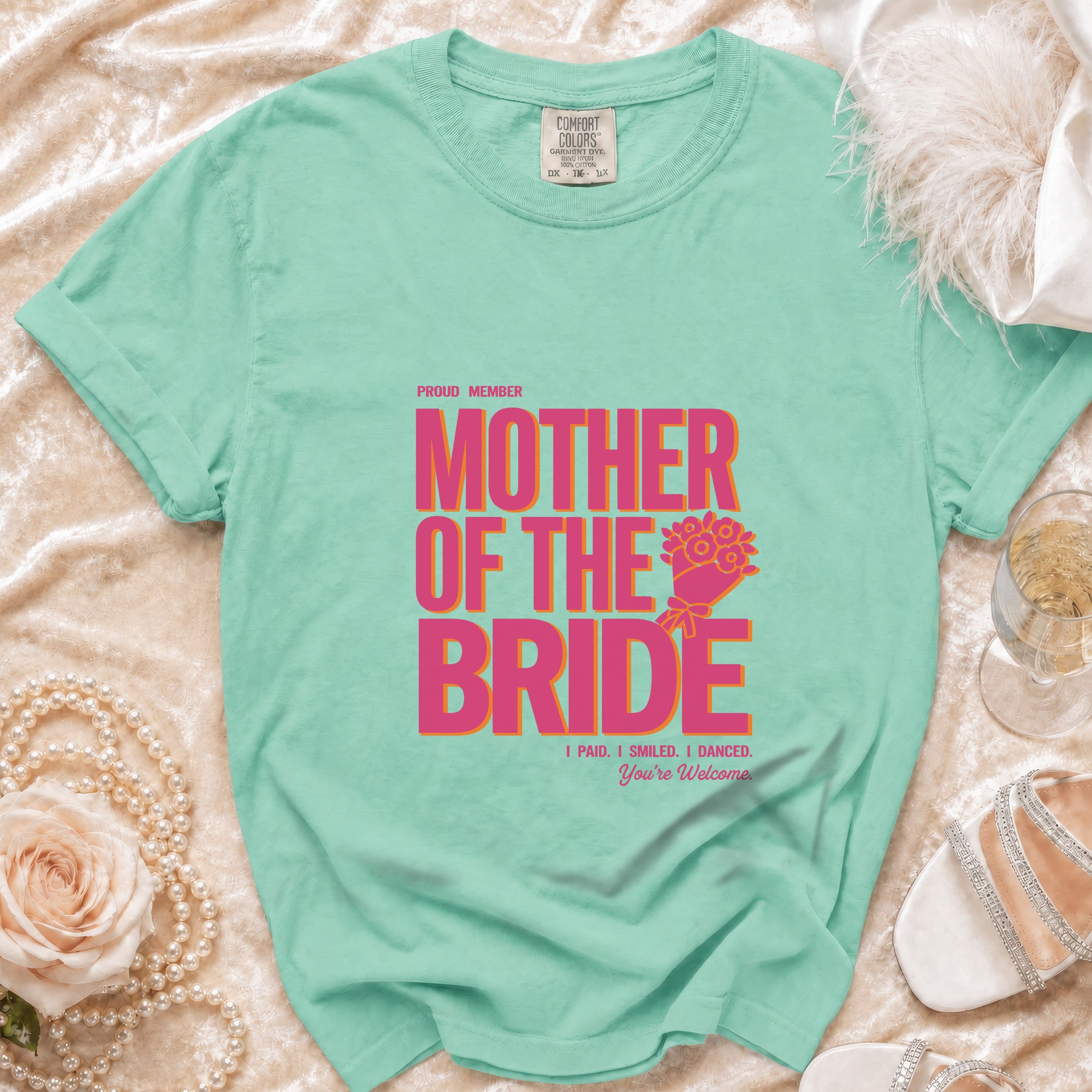 Mint green t-shirt with pink and orange text "Proud Member Mother of the Bride."