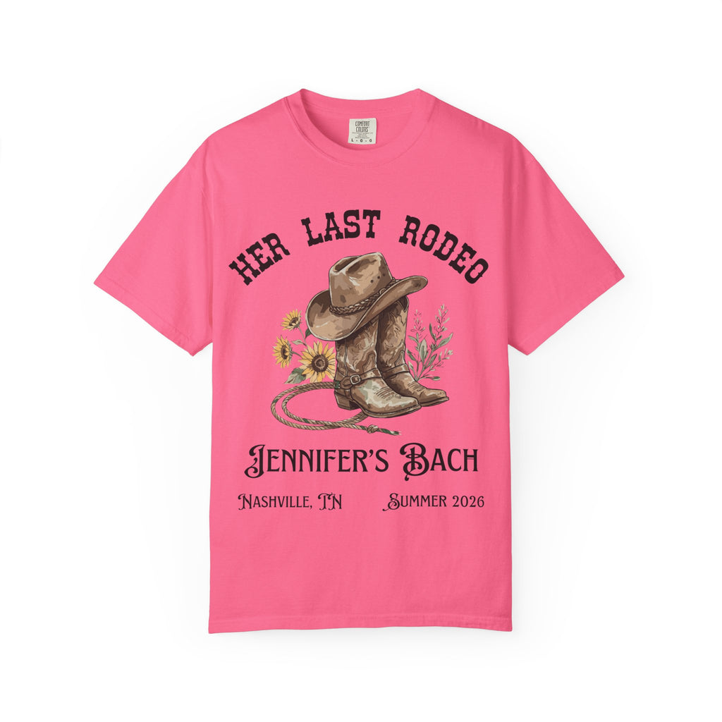 Pink t-shirt graphic with cowboy boots, lasso, and "Her Last Rodeo Jennifer's Bach" text.