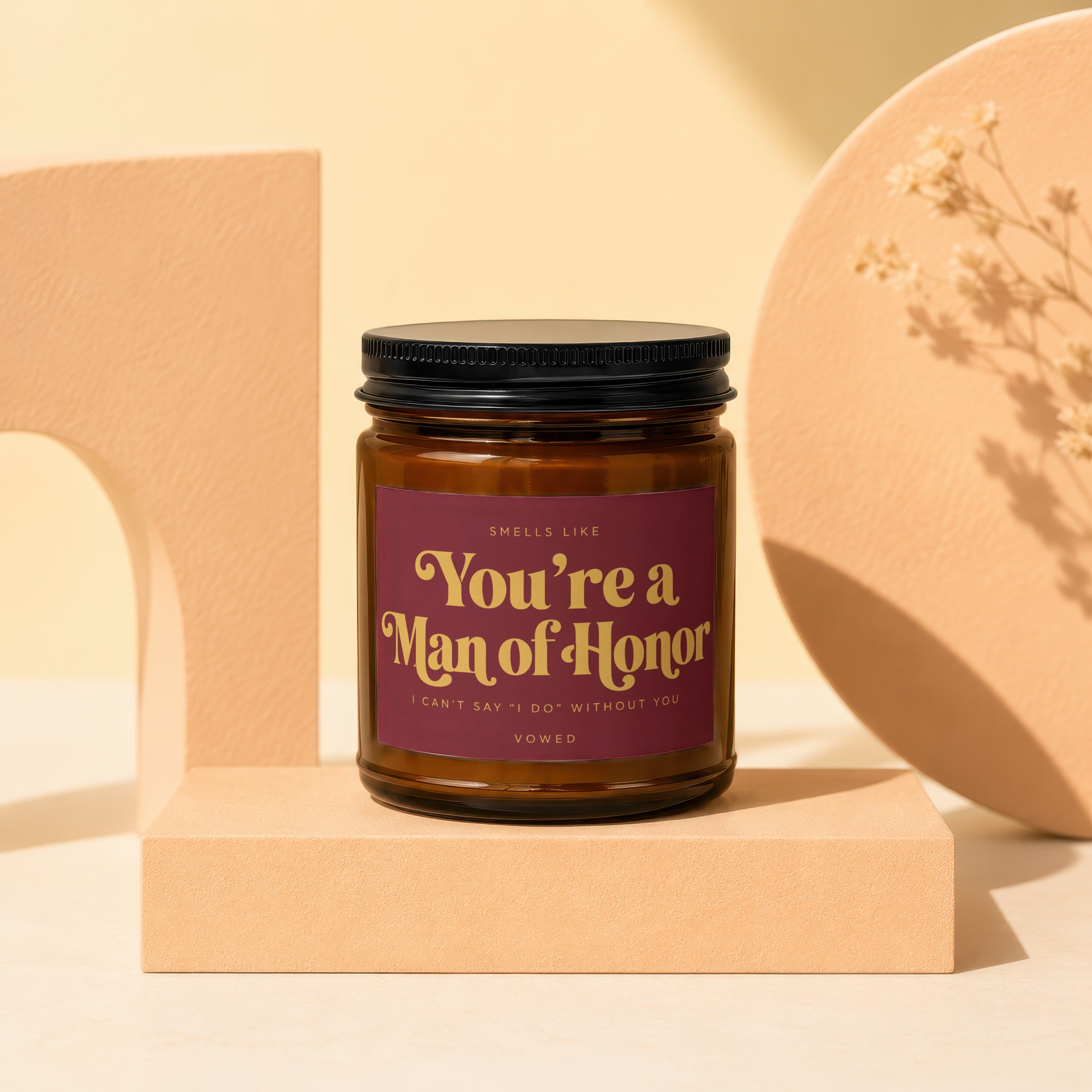 Brown candle with "You're a Man of Honor" text on burgundy label.
