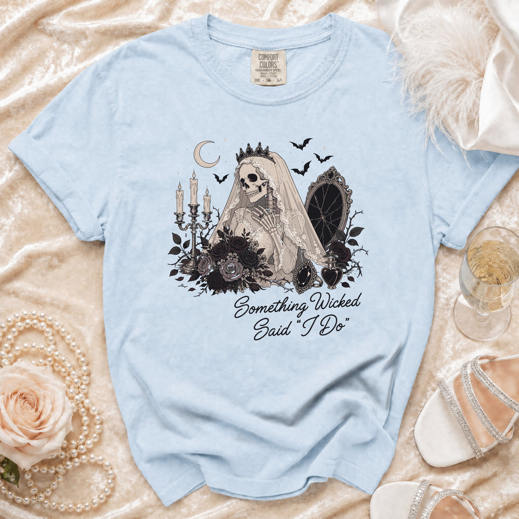 Light blue t-shirt with skeleton bride graphic and "Something Wicked Said 'I Do'".