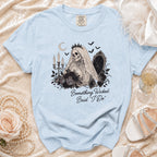 Light blue t-shirt with skeleton bride graphic and "Something Wicked Said 'I Do'".