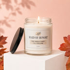 Candle with "Maid of Honor? You walk first. I'll follow." text and burning wick.