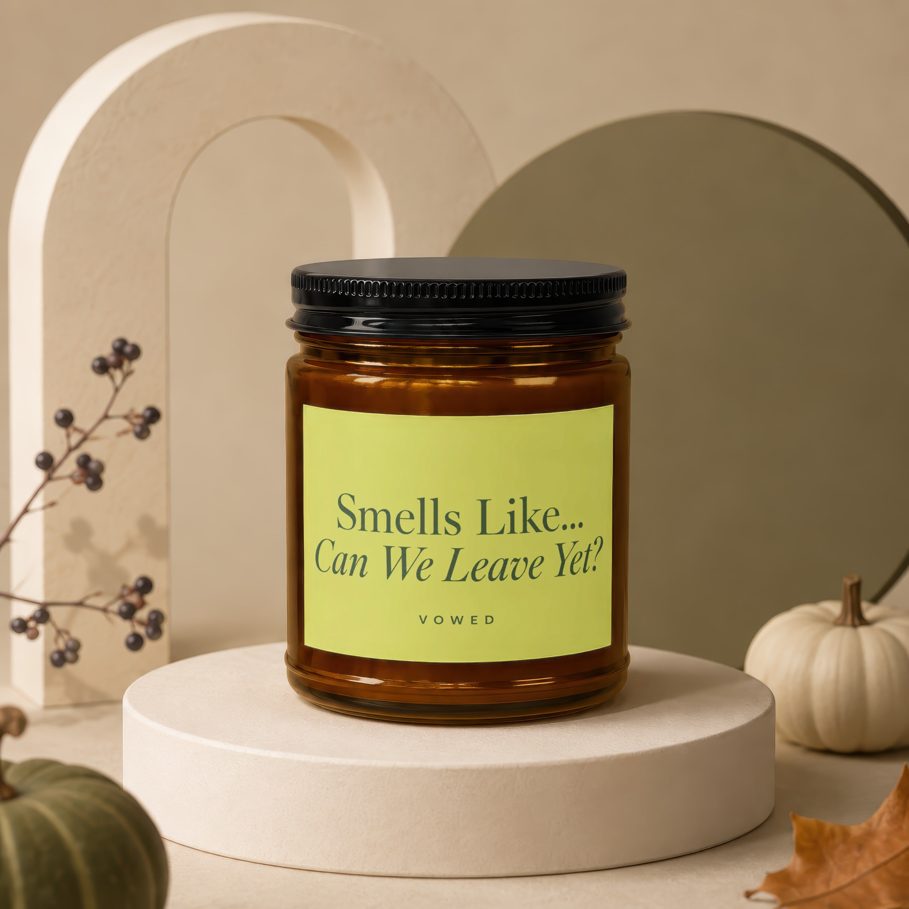 Candle with text "Smells Like... Can We Leave Yet?" on a light green label.